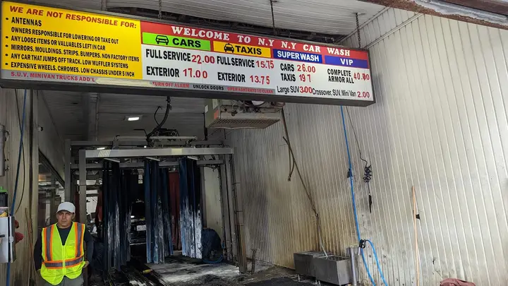 Wash tunnel brushes and price board